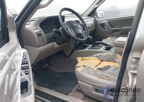 2004 Jeep Grand Cherokee Laredo z USA, uszkodzony, nr VIN 1J4GX48S14C187657